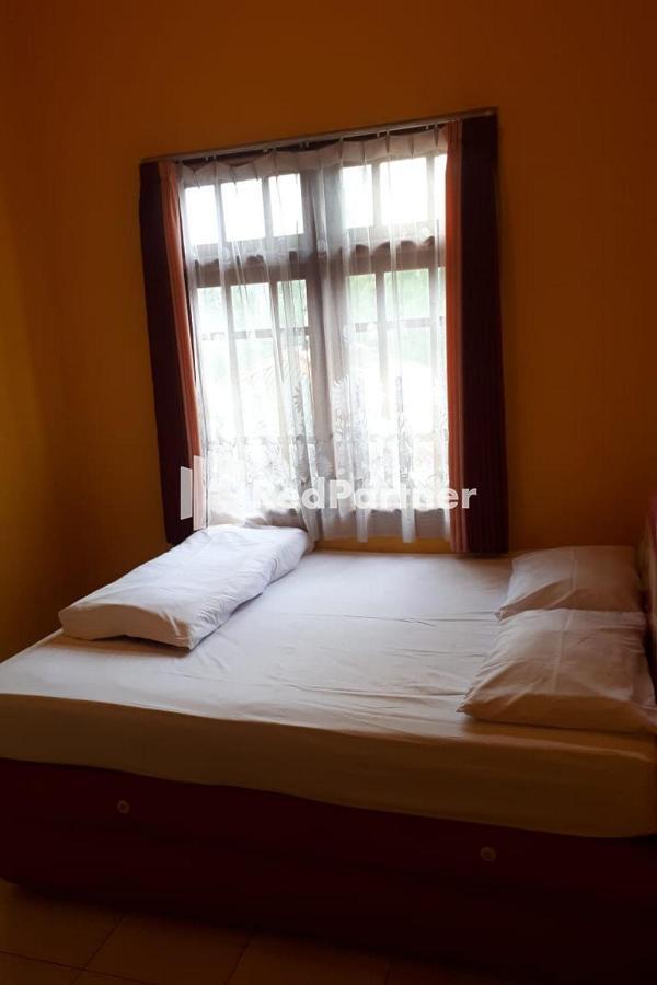 Bromo Indah Lestari Homestay Mitra Reddoorz ปาซูรูอัน ภายนอก รูปภาพ