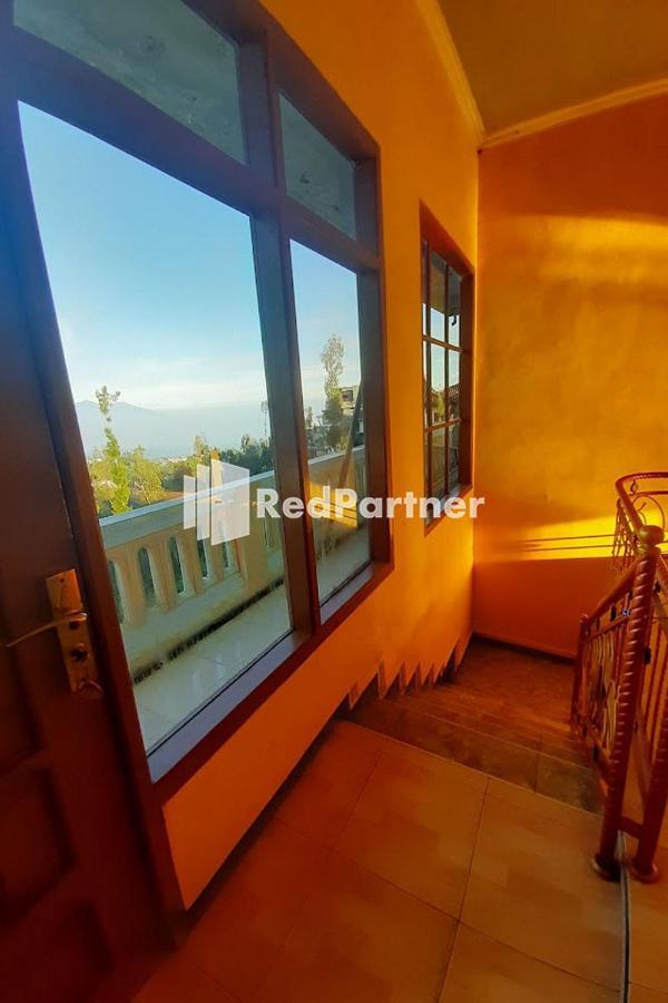 Bromo Indah Lestari Homestay Mitra Reddoorz ปาซูรูอัน ภายนอก รูปภาพ